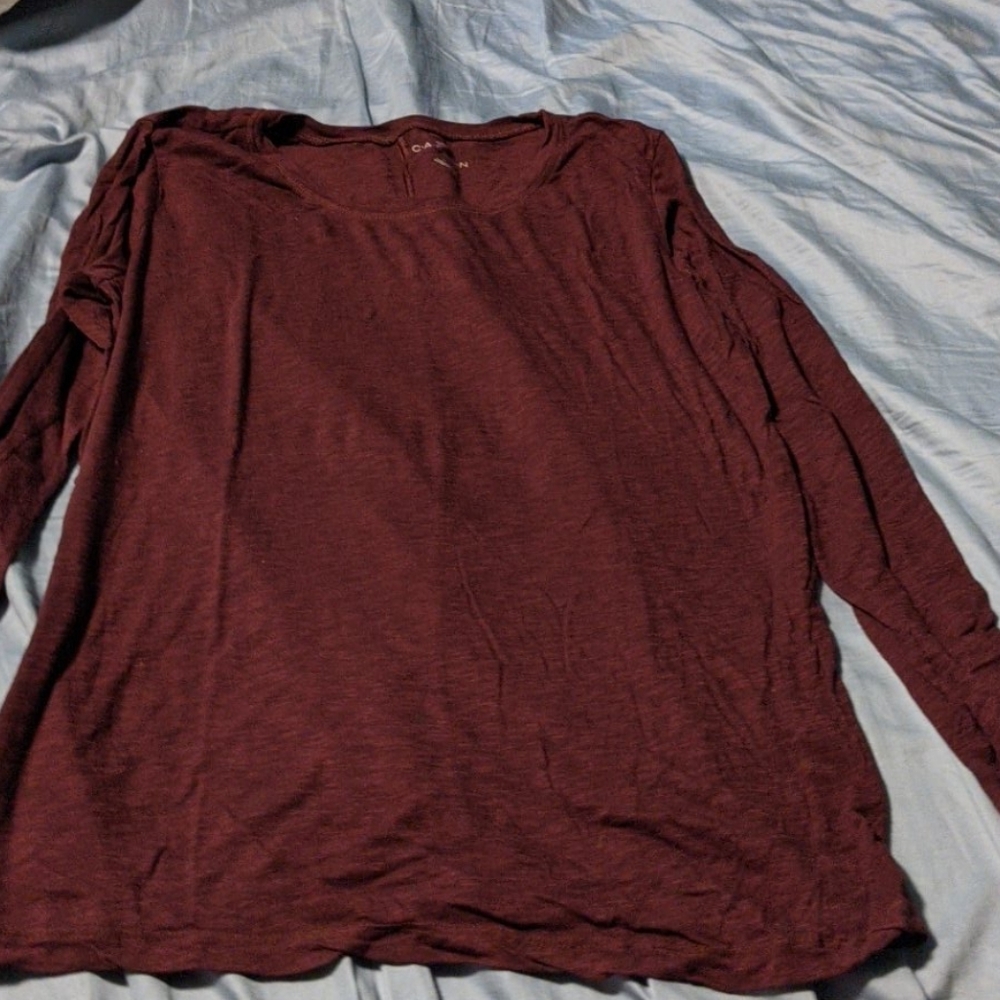 Long sleeve burgundy thin material t-shirt.